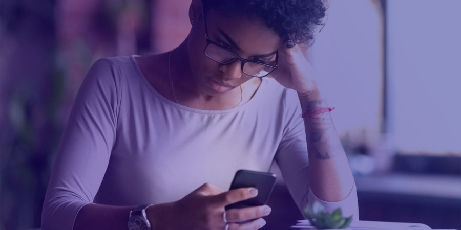 Mad biracial girl annoyed with smartphone problems