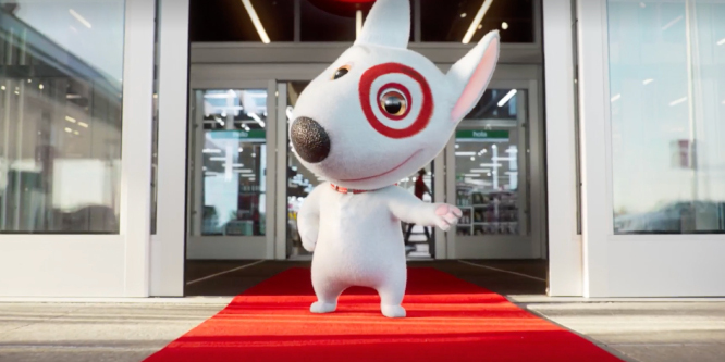 Image of Target's cartoon mascot dog Bullsey in front of a Target entrance