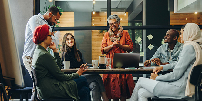 ey-happy-businesspeople-having-a-meeting-in-a-boardroom