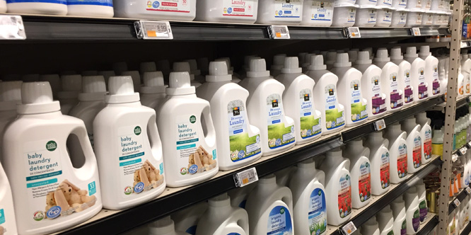 shelf of private label detergents in a store