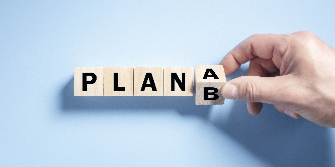 Change the wooden cube block word from Plan A to Plan B concept for strategy, change, alternative and perseverance