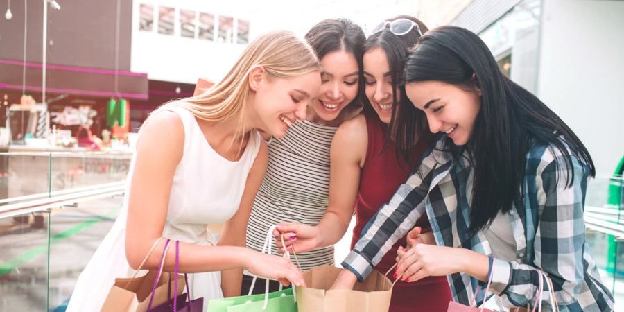 Girls looking into shopping bags