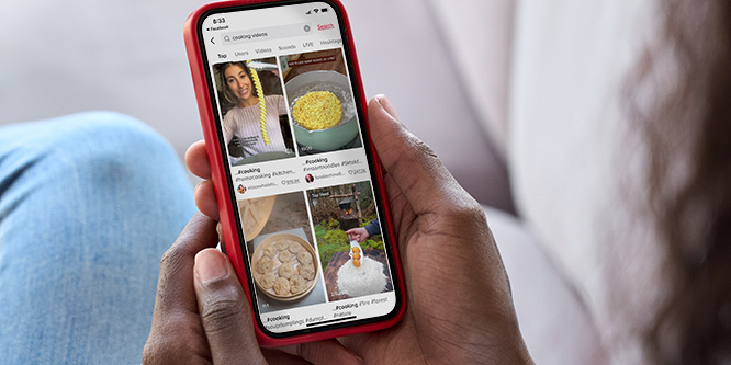 Person looking at TikTok on phone
