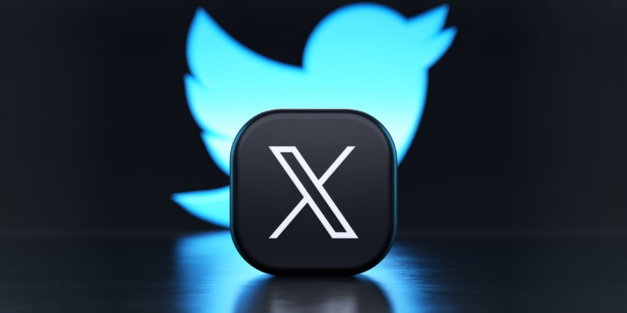 Glowing Twitter logo behind the new X logo